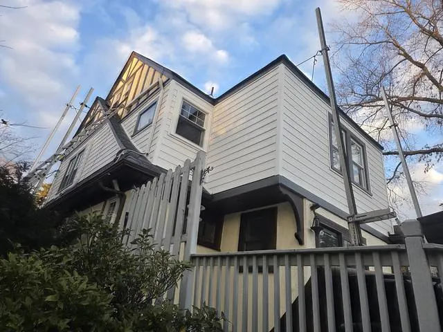 New gutters and trim on a white home