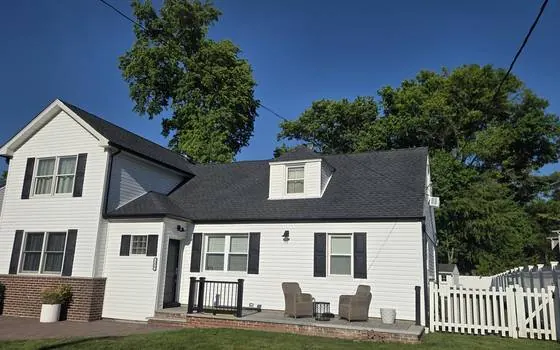 New roof on a white home