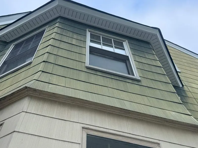 Shingle-style siding on dormer