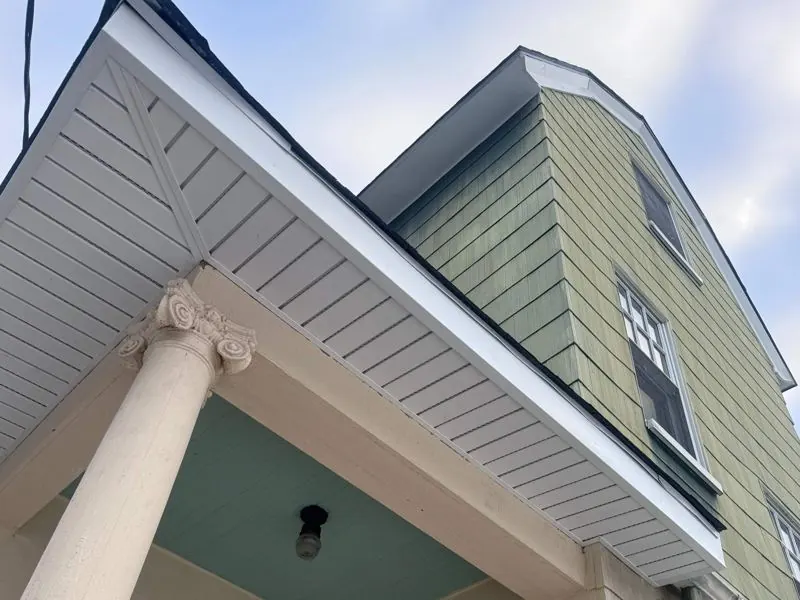 White vinyl soffit and fascia over porch
