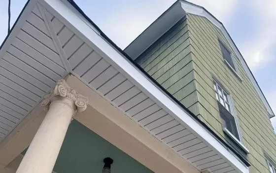 White vinyl soffit and fascia over porch
